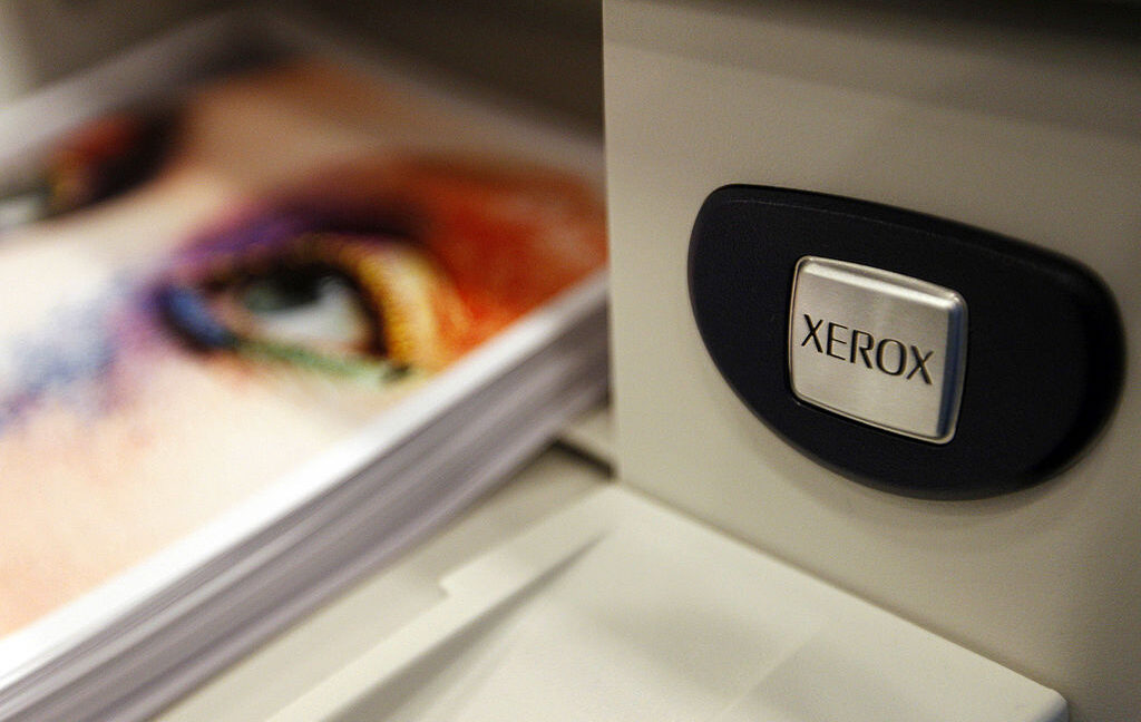 The Xerox logo is displayed on a printer