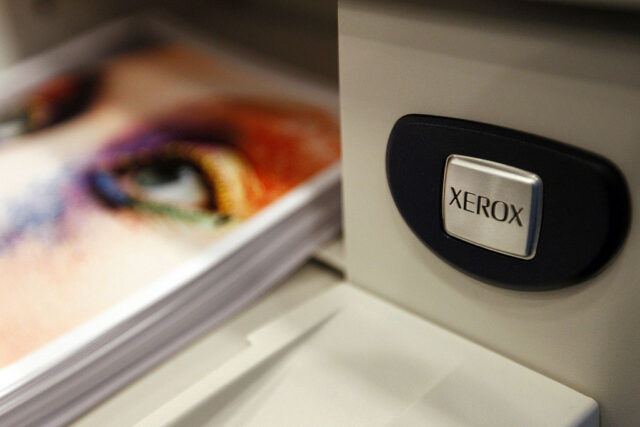 The Xerox logo is displayed on a printer