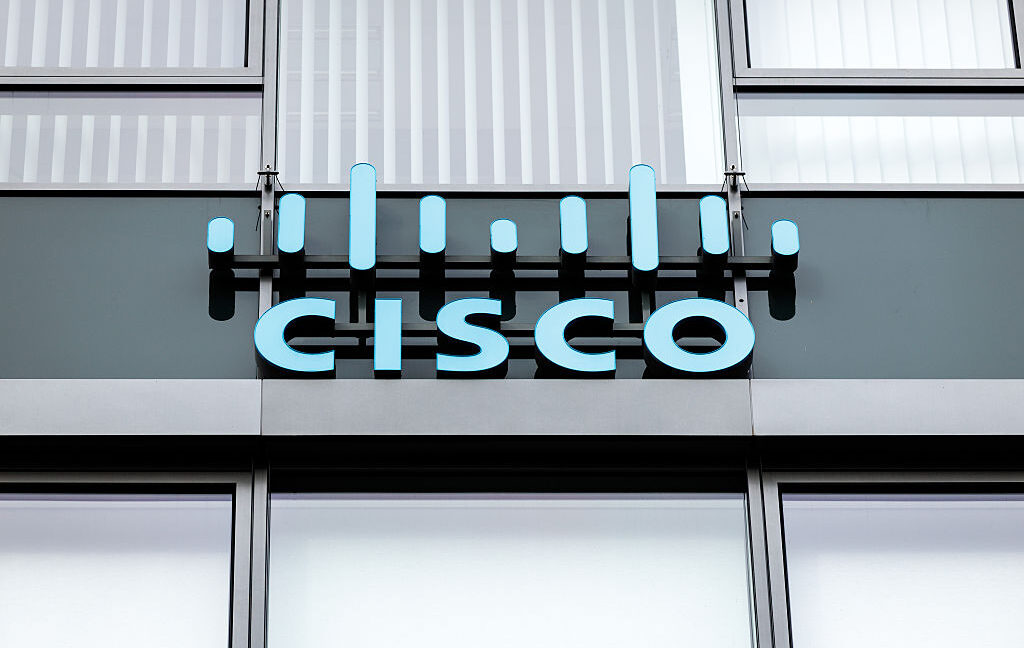 The Cisco Systems, Inc. logo and lettering can be seen on the Cisco Systems GmbH headquarters building in Garching, Germany