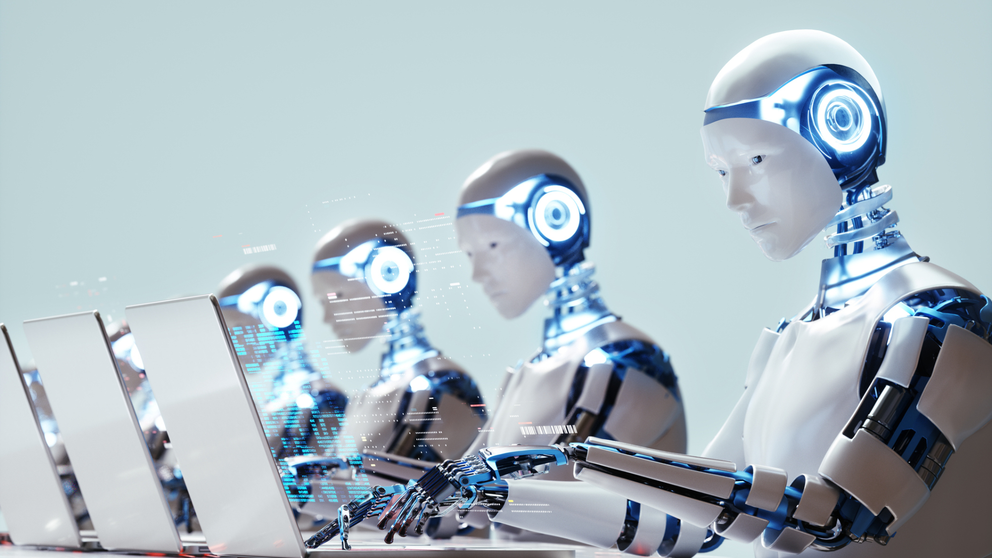 Robot / AI workers at work on laptops