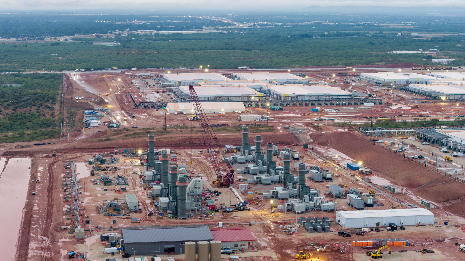 Gas turbines made by GE Vernova, at the on-site natural gas plant under construction during a media tour of the Stargate AI data center in Abilene, Texas,