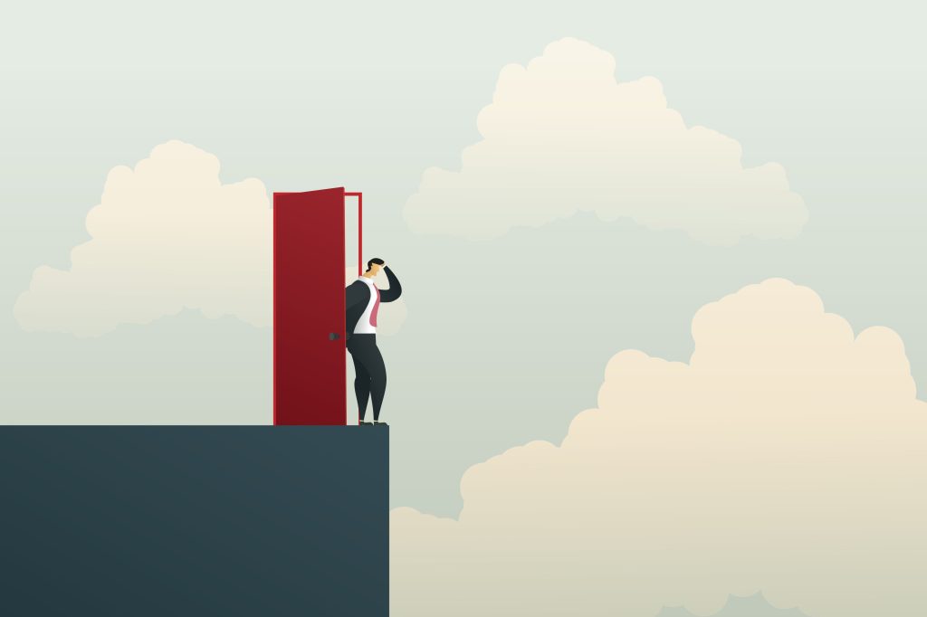A conceptual illustration of a professional figure standing on a precipice after stepping through a standalone red door. He gazes out over a vast, cloudy abyss with a hand to his forehead in a gesture of concern, symbolizing the uncertainty and the widening gap in the AI industry’s new "barbell economy."