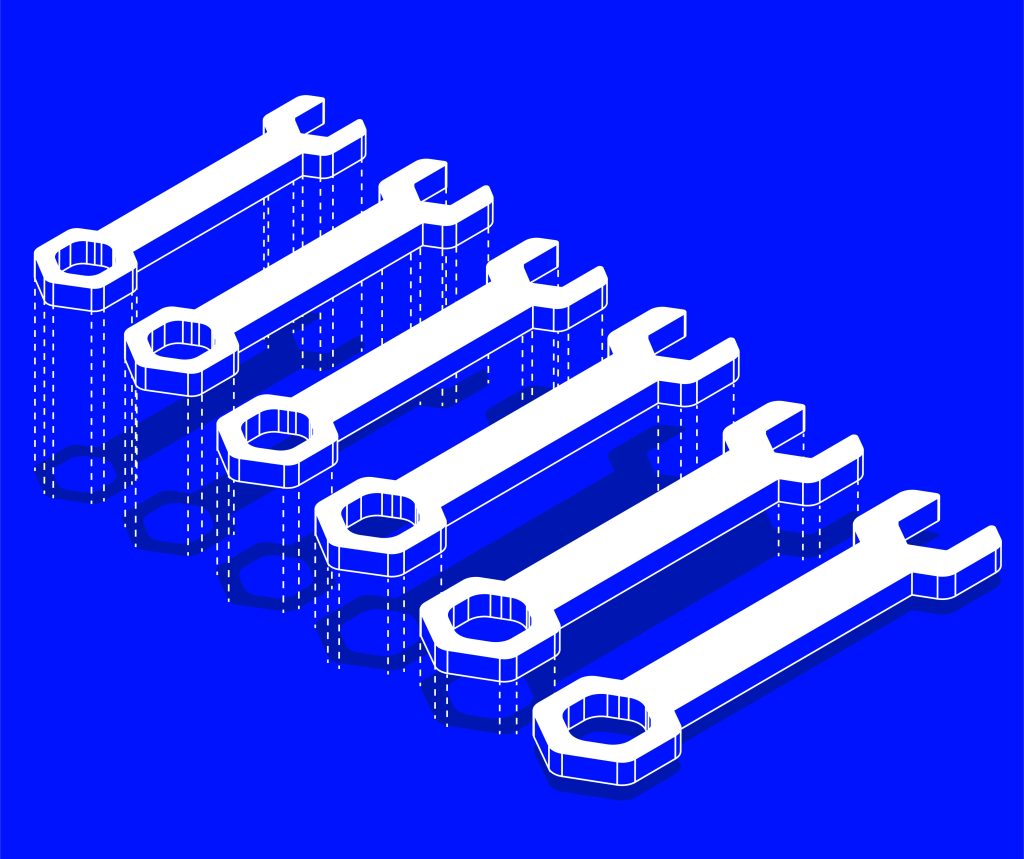 set of wrenches against blue background