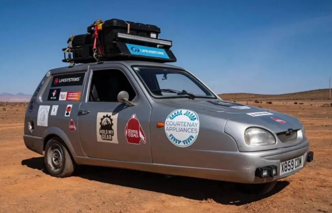 两男子开三蹦子成功穿越非洲 没空调一路修车还差点被空袭送走